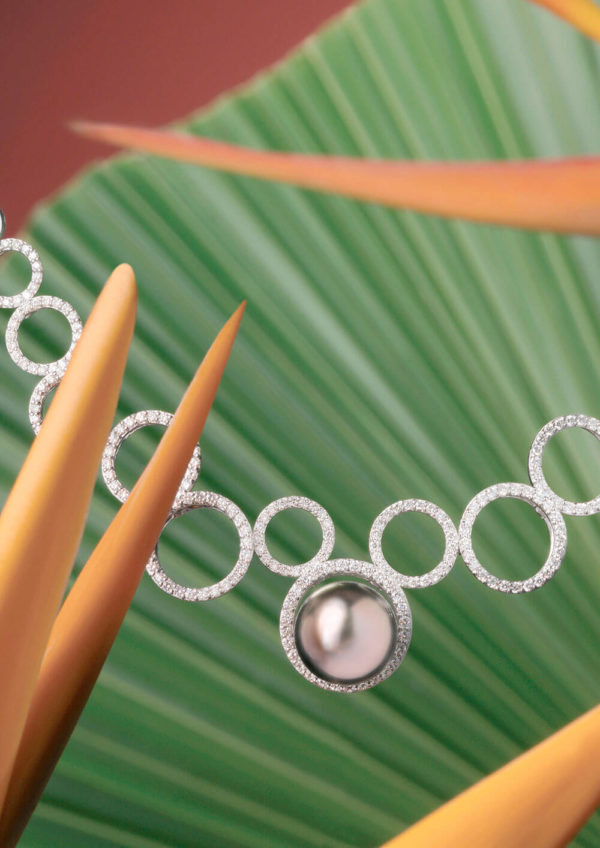 Black pearl in diamonds cercles necklace